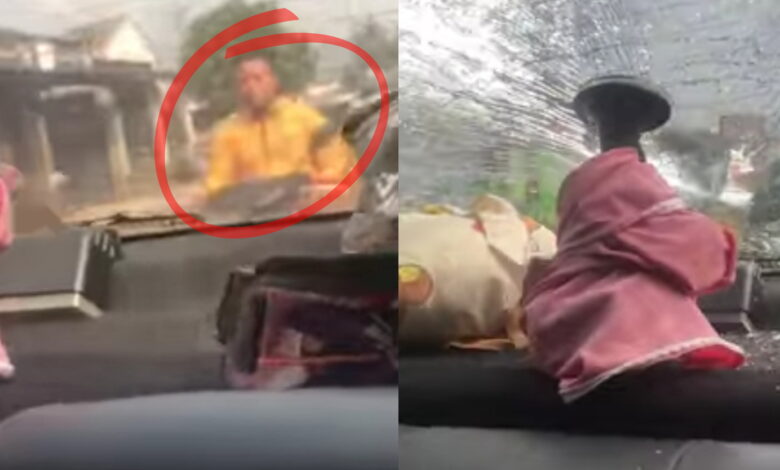 PELEMPARAN: Aksi pelemparan batu yang berujung pengrusakan sebuah mobil pada Sabtu (22/5/2021), viral di jagat maya. (Tangkapan layar video)