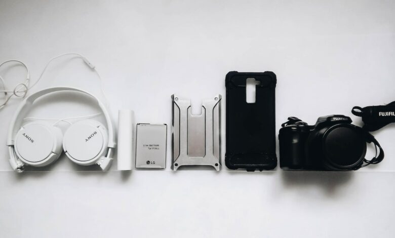 white Sony headphones and black smartphone case